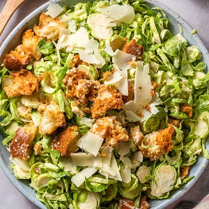 Shredded Brussel Caesar Salad